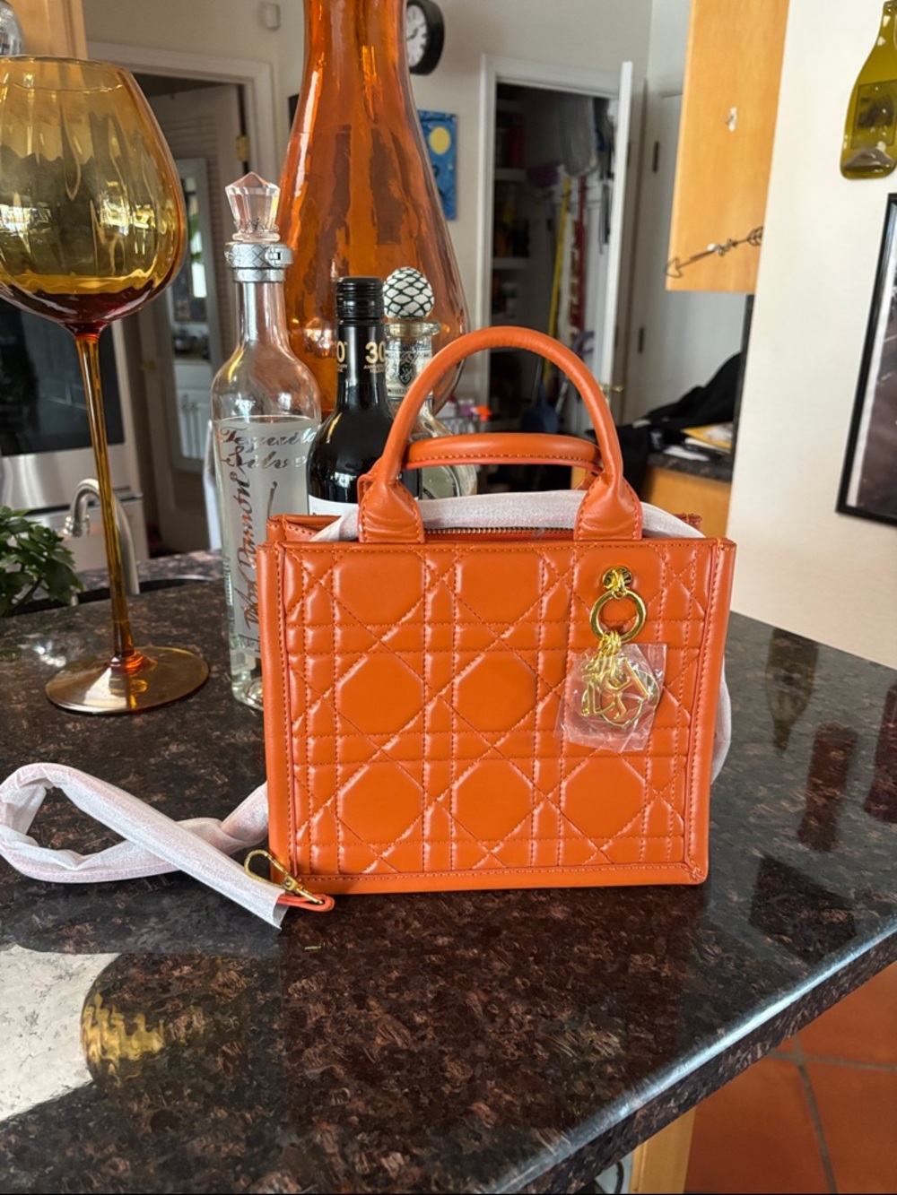 Source Unknown Orange Quilted Mini Tote Bag with Gold Charm that says DIOR